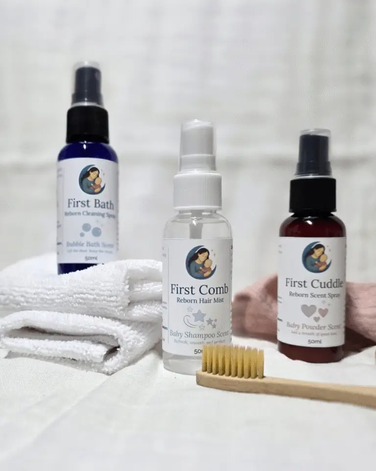 Trio photo of the Moon & Milk Dolls First Cuddle, First Comb and First Bath sprays displayed together.